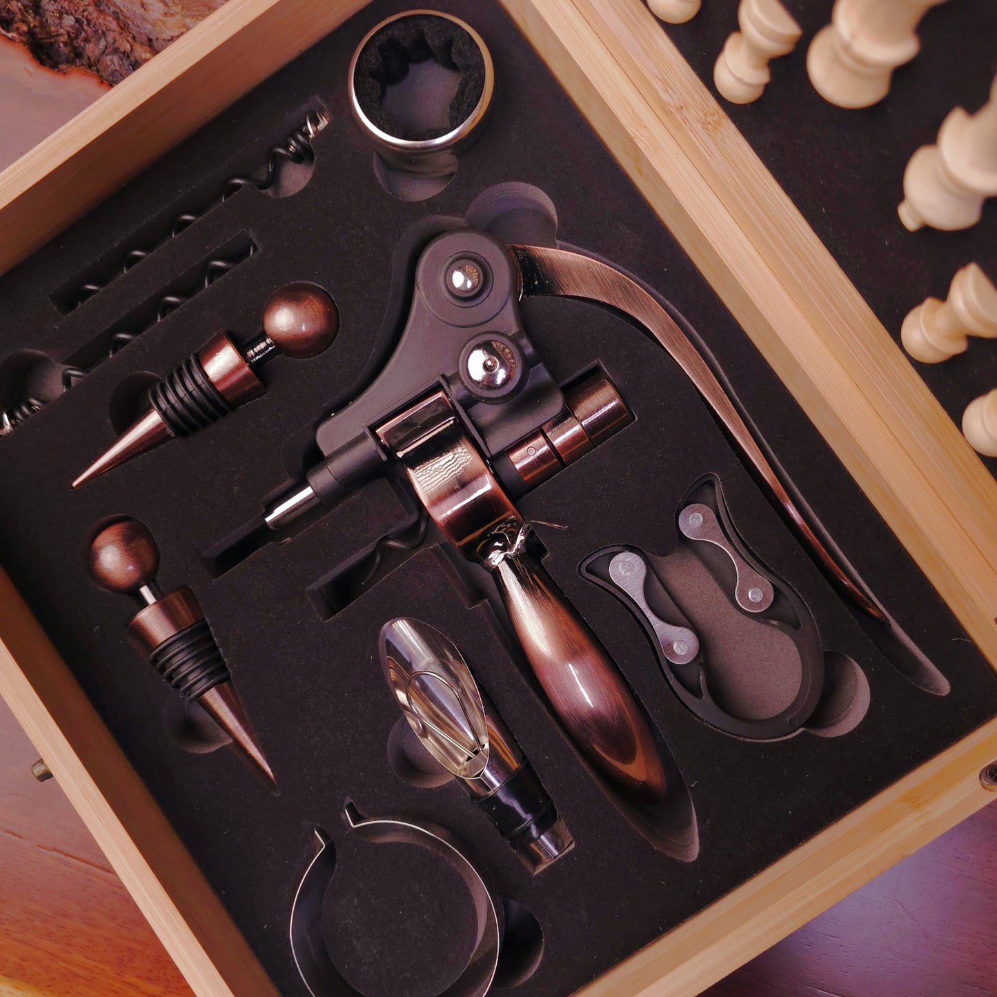 Wine opener set with various tools in a wooden box