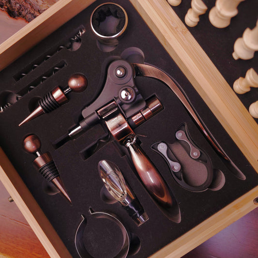 Wine opener set with various tools in a wooden box
